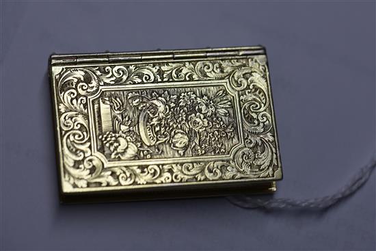 A Victorian silver gilt vinaigrette, modelled as a book, by Rawlings & Summers,